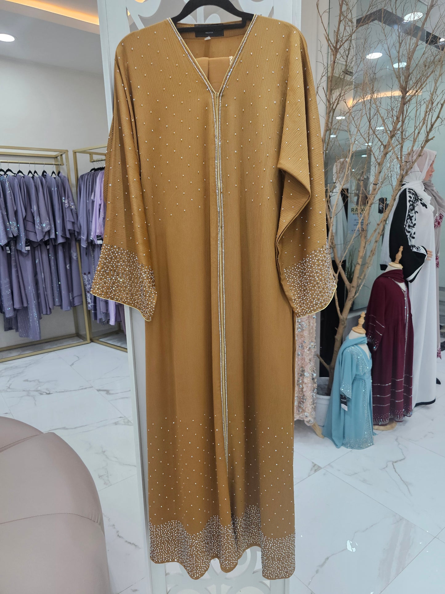 ABAYA RAZINA
