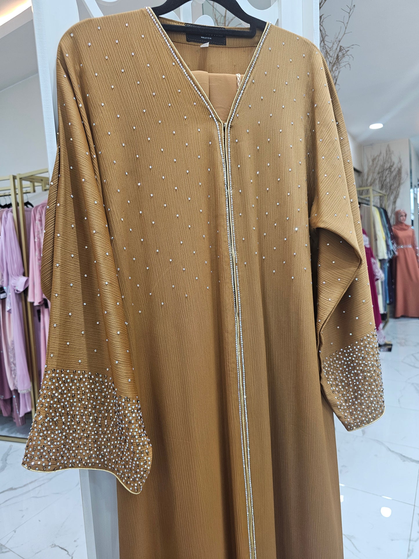 ABAYA RAZINA
